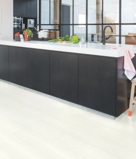 Quick Step - White Plank Laminate Flooring